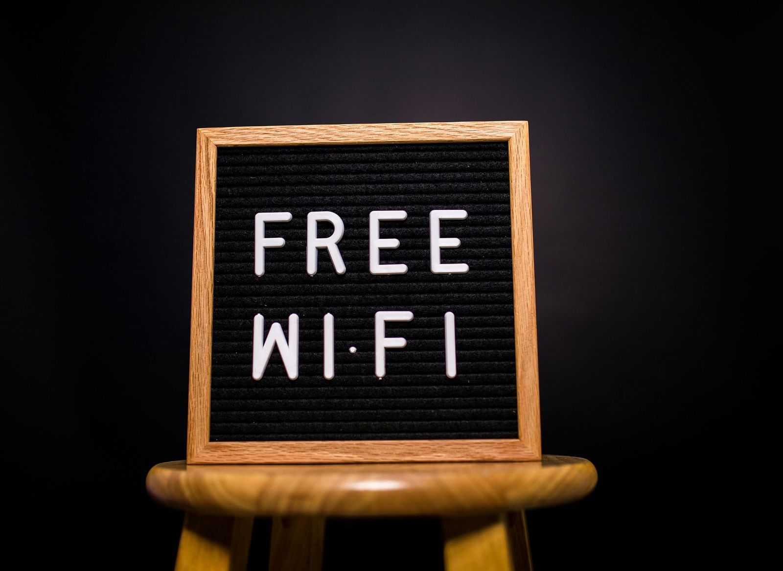 Small board displaying Free Wi-Fi on a stand