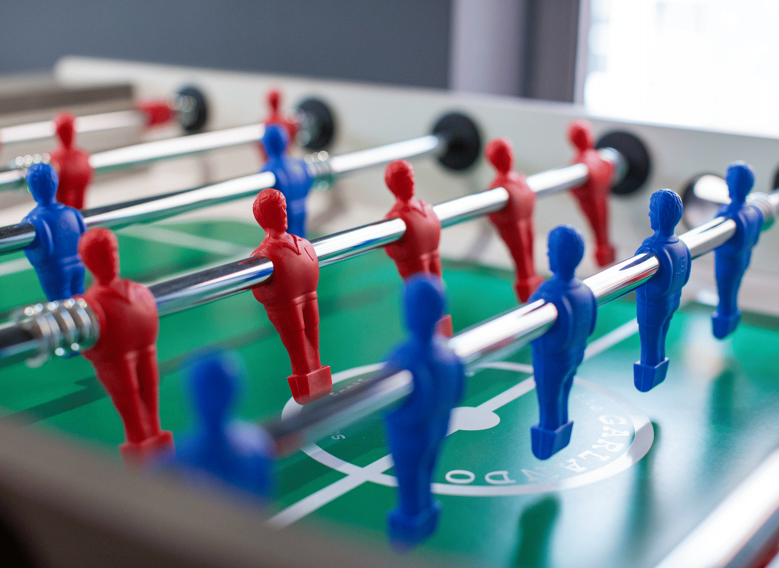 Close up image of a foosball table.