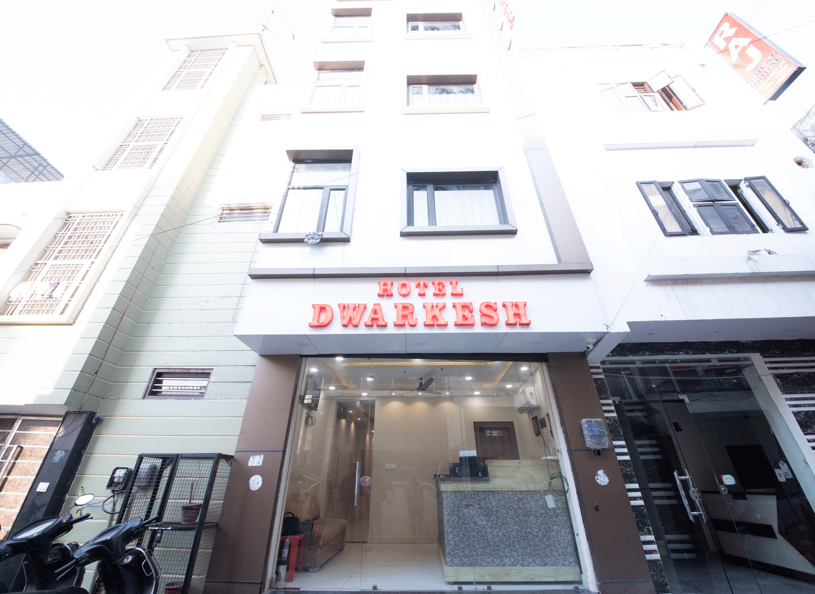 Exterior view of the hotel building entrance at Perfectstayz Value Dwarkesh, Haridwar.