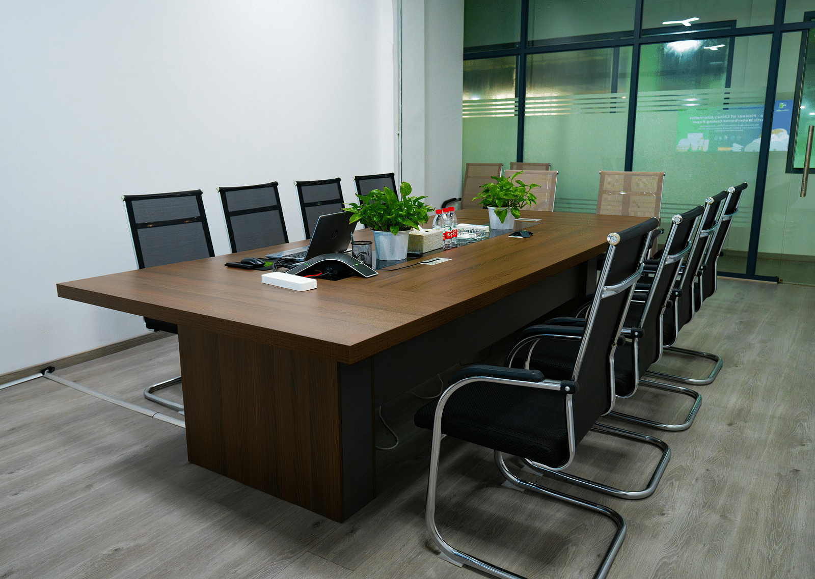 A boardroom with chairs and table