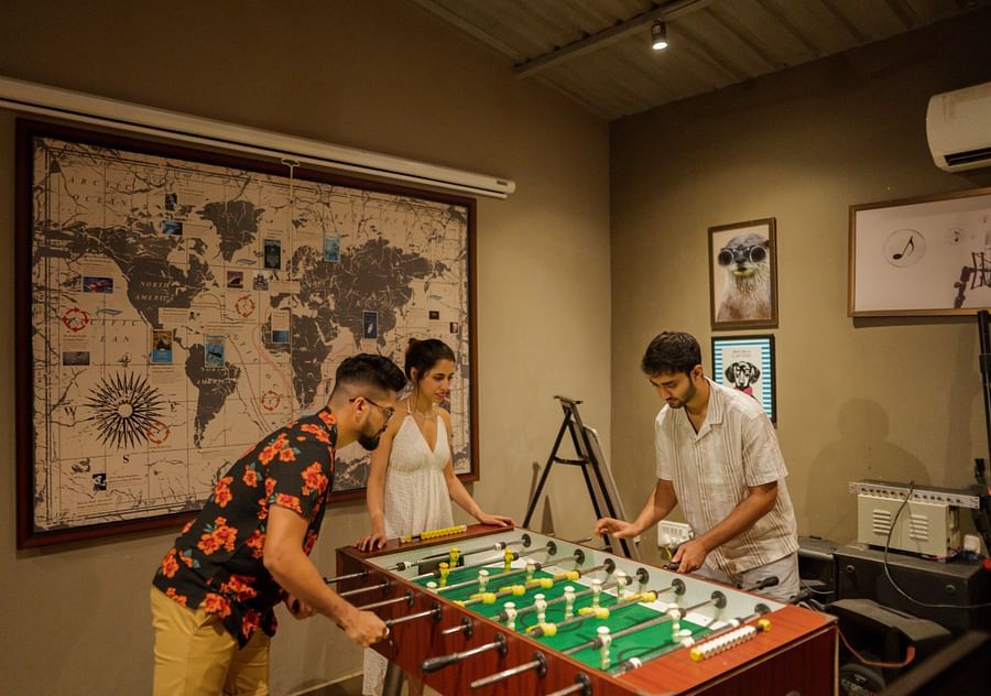 guests playing foosball at cintacor island resort