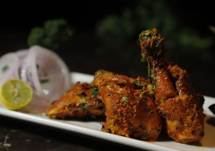 Udman By Ferns N Petals, Chattarpur - chicken dish on a table