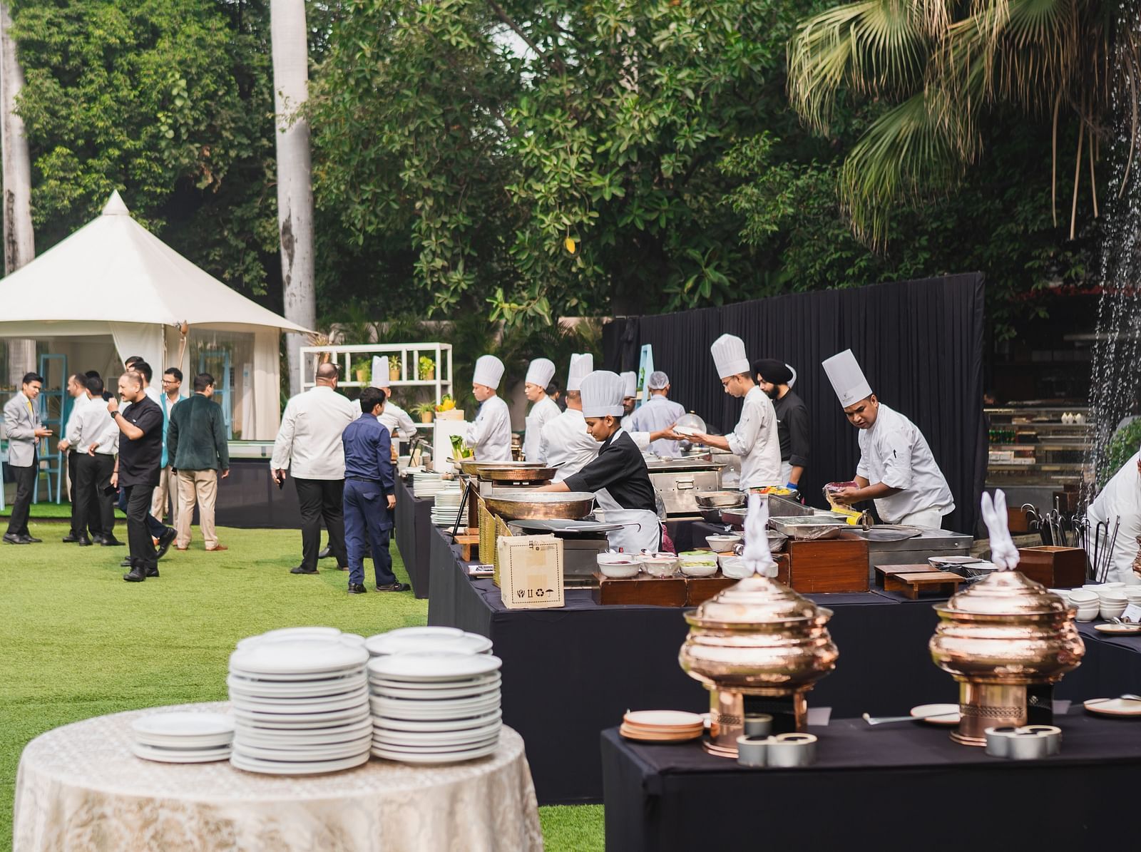 image of a get together organised at the claridges garden with sumptuous buffet - The Claridges New Delhi