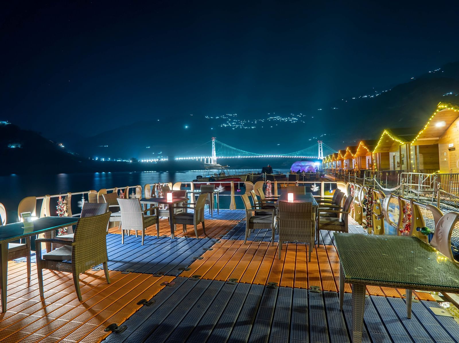 ariel and front view of the floating huts at Le ROI Floating Huts Eco Rooms captured during the day and at night4