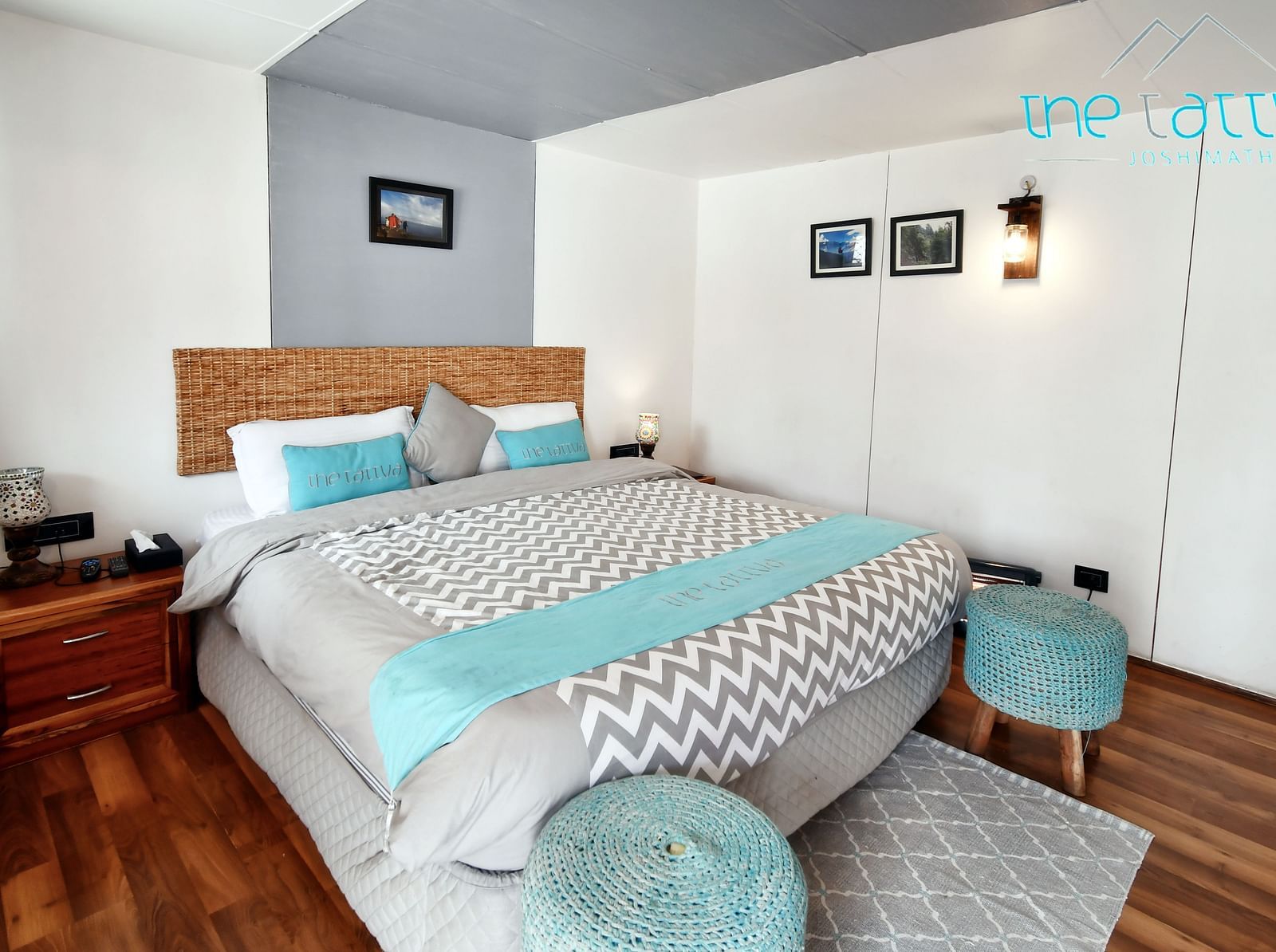 image of the deluxe room featuring a plus double bed with ample of natural light - The Tattva Boutique Resort
