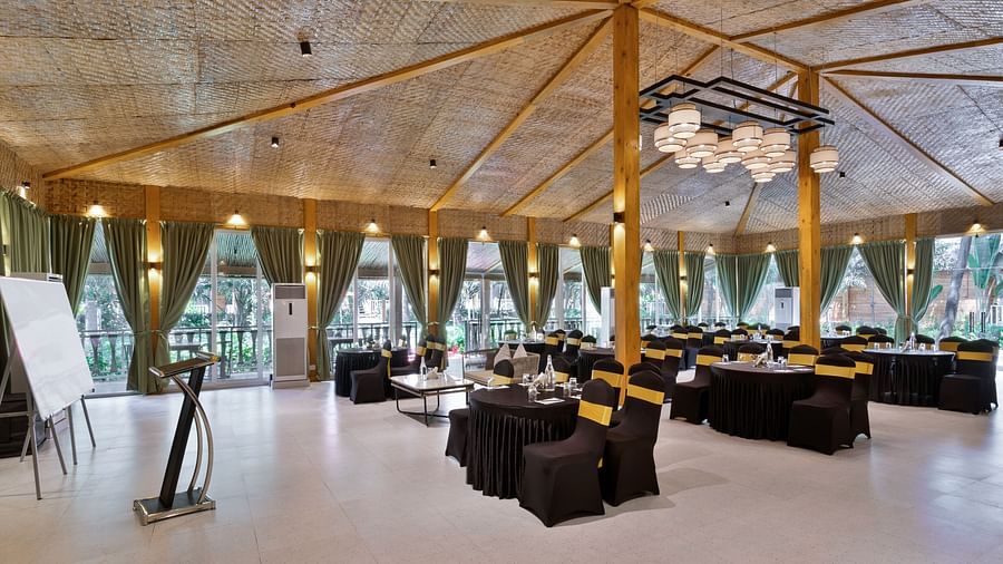 Banquet hall with serene interior decoration at Aralea Beach Resort by Stone Wood, Morjim