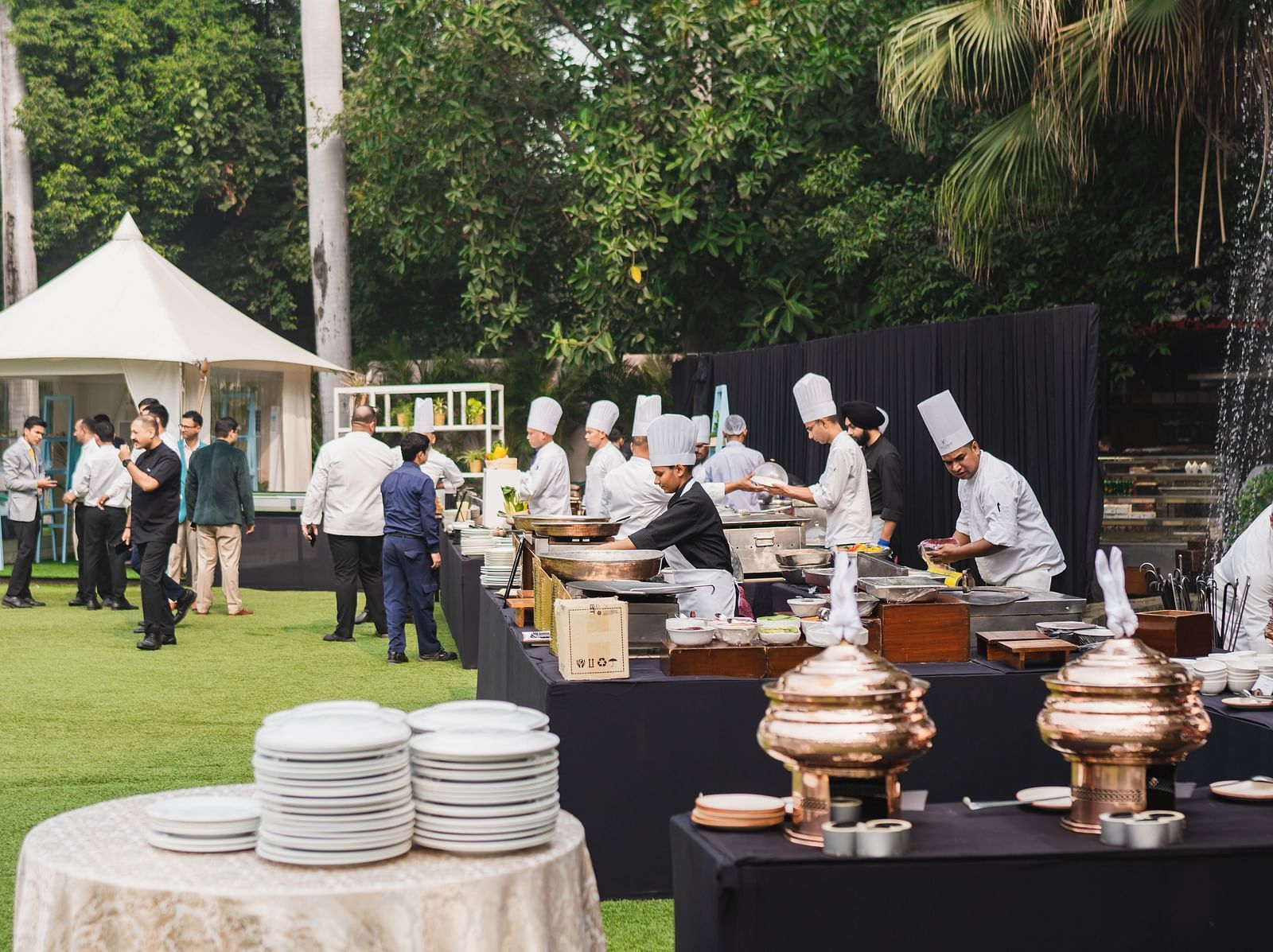 image of a get together organised at the claridges garden with sumptuous buffet - The Claridges New Delhi