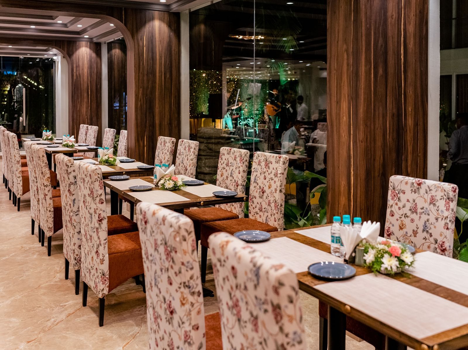 seating arrangements inside the in-house restaurant - The Tanisi Hotels & Resorts, Goa