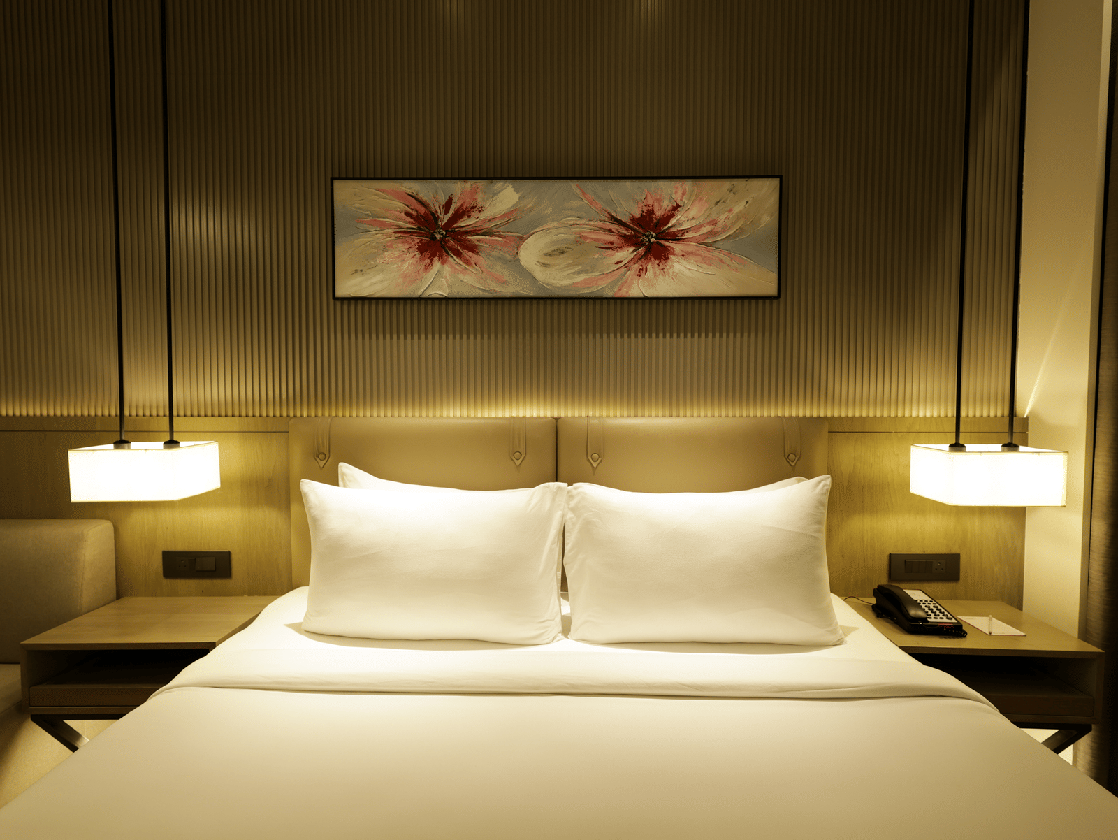 Cosy room with a king size bed and modern decor at Ramada by Wyndham Sonipat Murthal