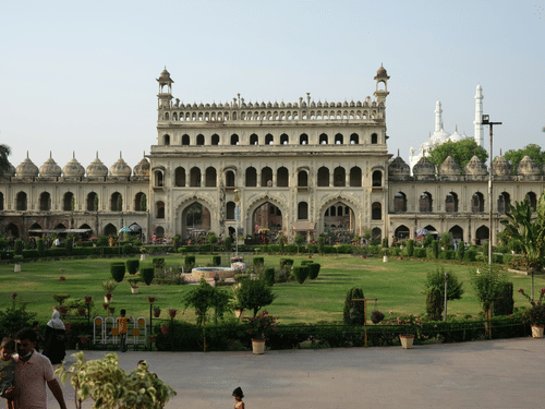 A widee shot of Bara Imambara in Lucknow, with bright blue sky in the background.
