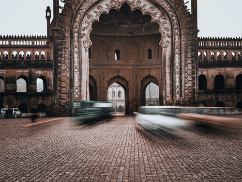 Historic Rumi Darwaza archway in Lucknow with intricate Mughal design.