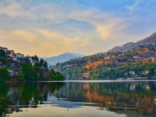 Scenic sunset view over Bhimtal Lake and surrounding hills