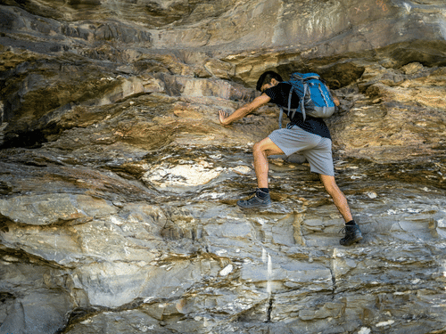 Adventure rock climbing activity on natural cliffs