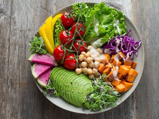 A salad with a variety of vegetables - Stone Wood Riverfront Resort, Siolim