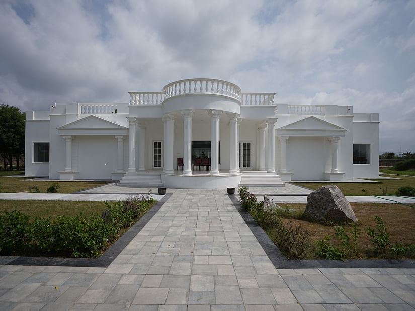 Facade view of Ashok Vatika Ananta Elite, Ranakpur with stone pathway leading to the hotel