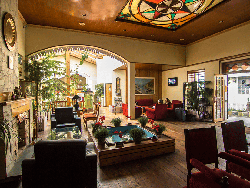 Lobby of Central Heritage Resort and Spa featuring multiple seating spaces in a vintage setting