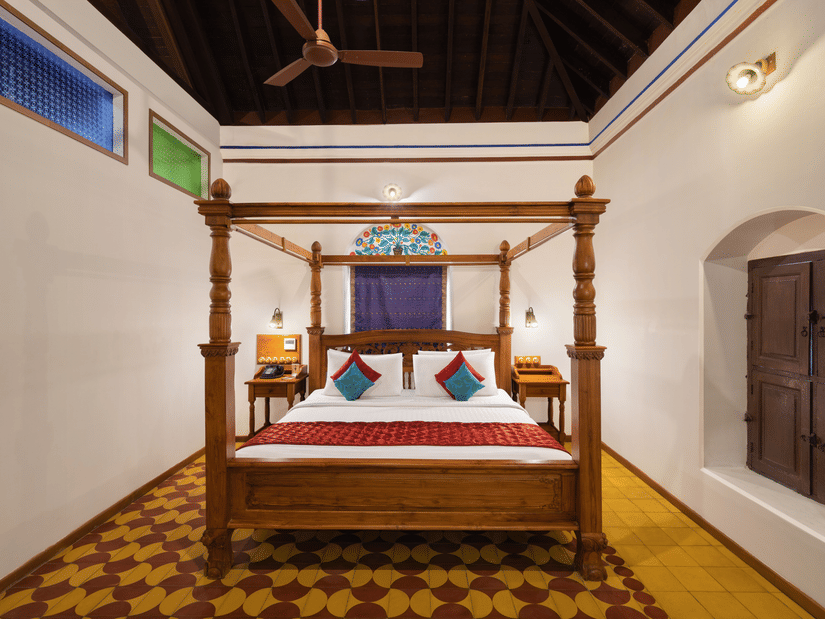 An overview of the suite with a double bed in view at Chidambara Vilas, a premium resort stay in Pudukkottai