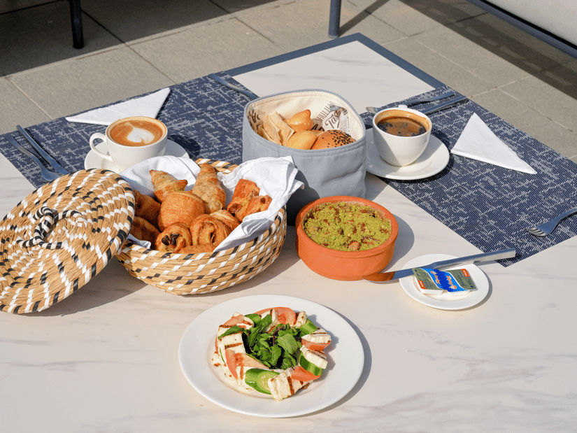 DSC 7468Assorted breakfast dishes with pastries, dips and fresh salad enjoyed al fresco at La Maison Hotel, Doha.