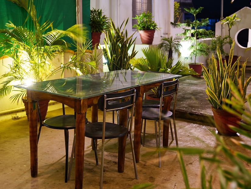 a table at the rooftop dining area of La Paradise Residency