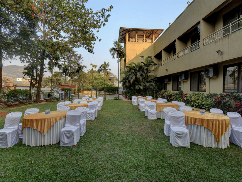 A wedding lawn setup with banquet seating for outdoor events at VITS Lonavala.