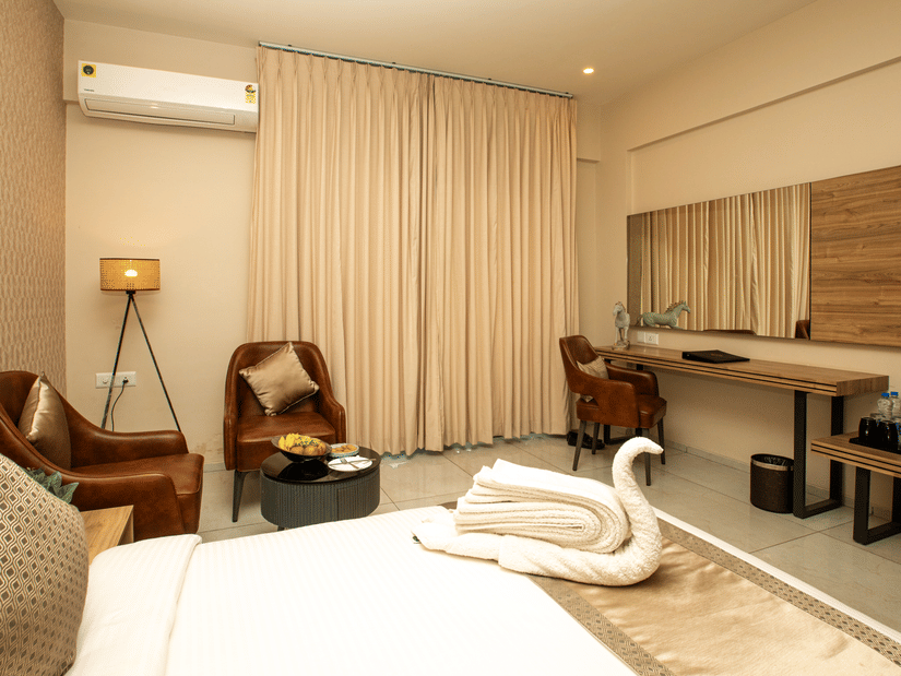 Picture of the interior of the well furnished  room with a king bed