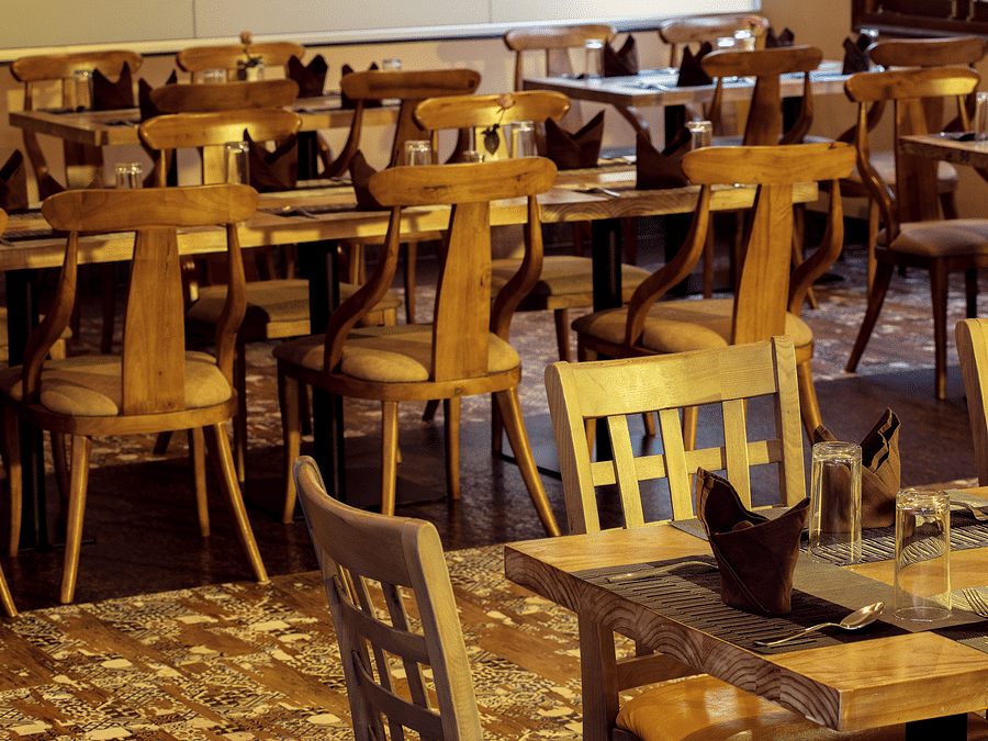 chairs set up at our multi-cuisine restaurant in surya city