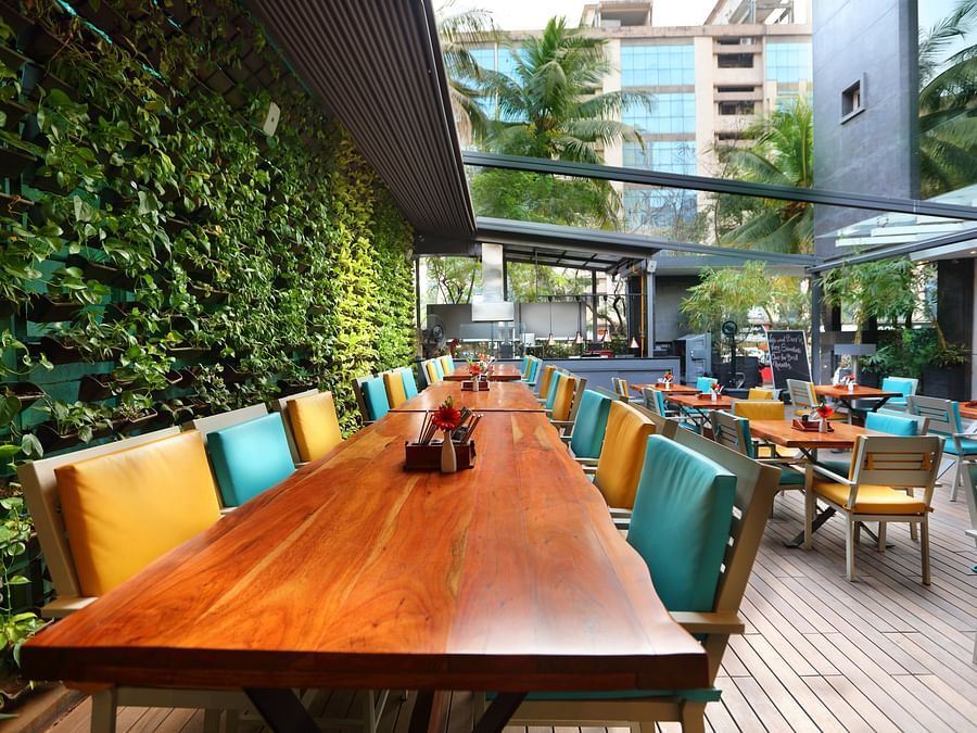 The Empresa Boutique Hotel - the colourful seats offered at Loca Loca Bistro in Andheri 2