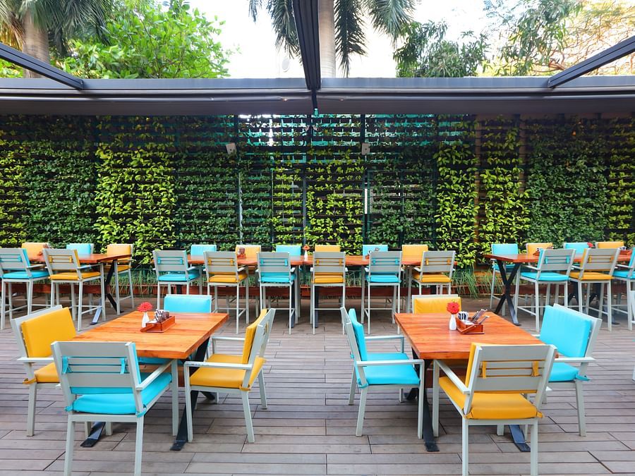 The Empresa Boutique Hotel - the colourful seats offered at Loca Loca Bistro in Andheri