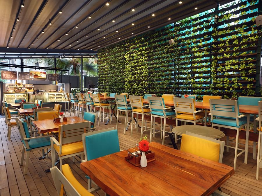 The Empresa Boutique Hotel - the colourful seats offered at Loca Loca Bistro in Andheri 1