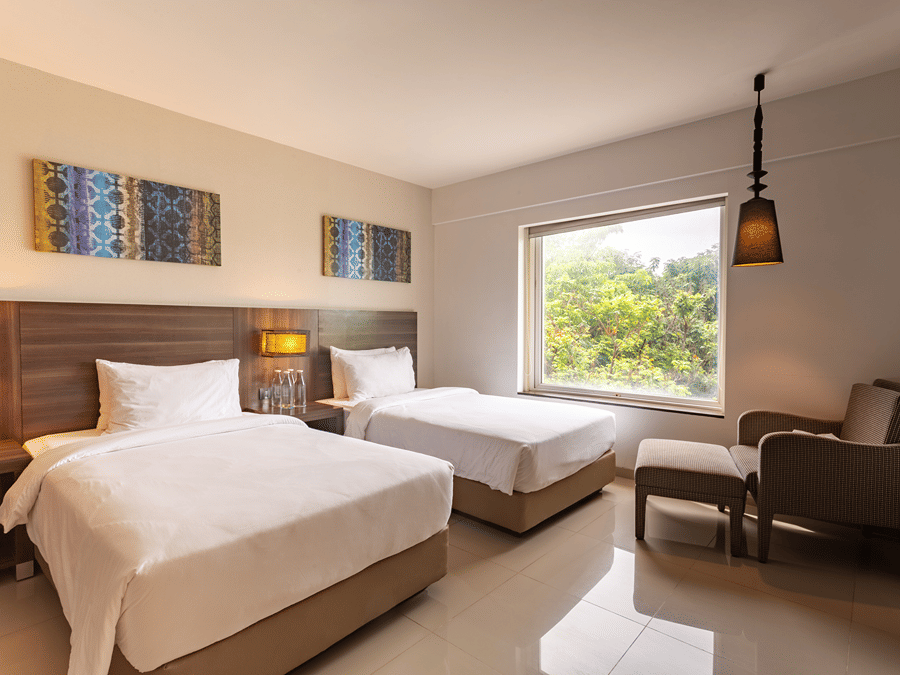 Twin Room with two bed overlooking the pool at The Residency Towers Rameswaram