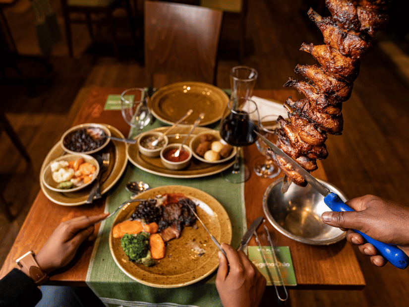A view from the top of the many items placed on a table inside the restaurant - Ramada by Wyndham Addis, Addis Ababa.