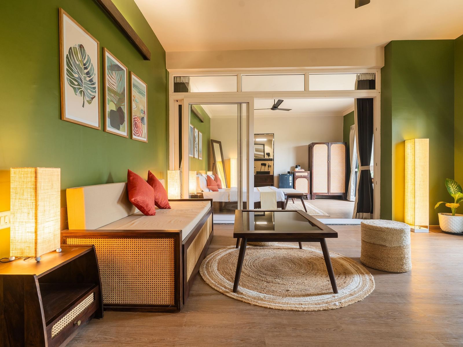 Open-plan suite with a cosy lounge, ambient lighting, and curated decor at Kssemya.