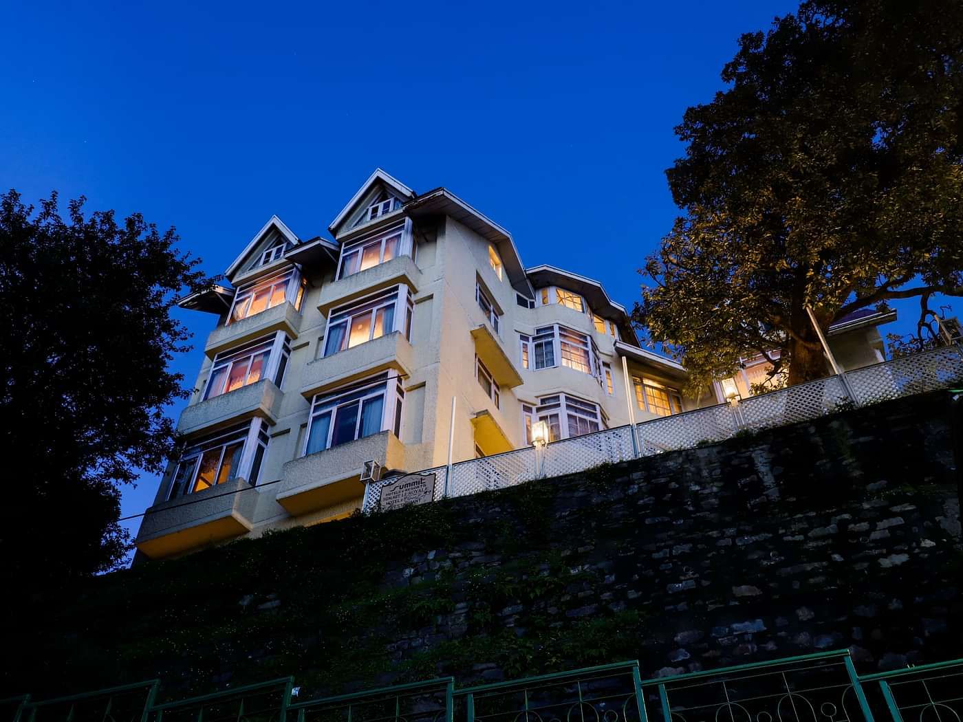 Nighttime exterior view of Summit Le Royale Hotel, Shimla