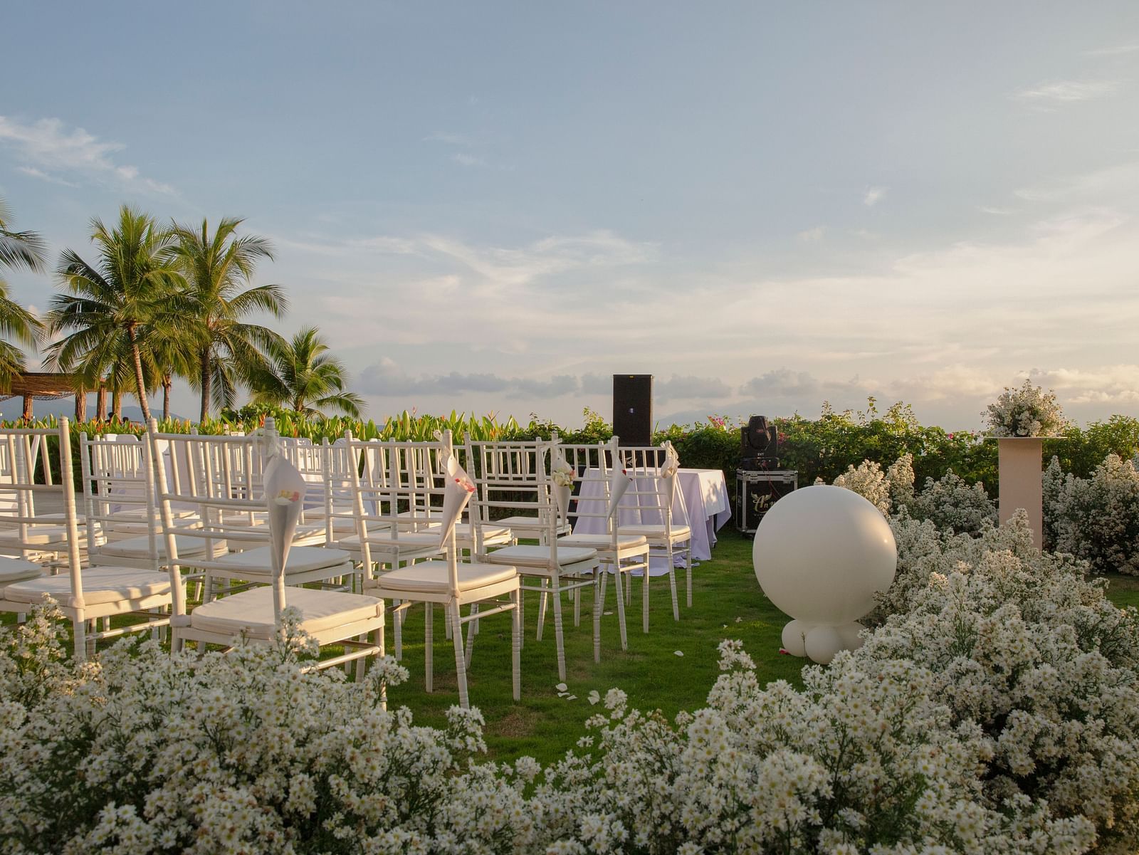 A lawn used for weddings seen during a sunset - Alibu Resort Nha Trang