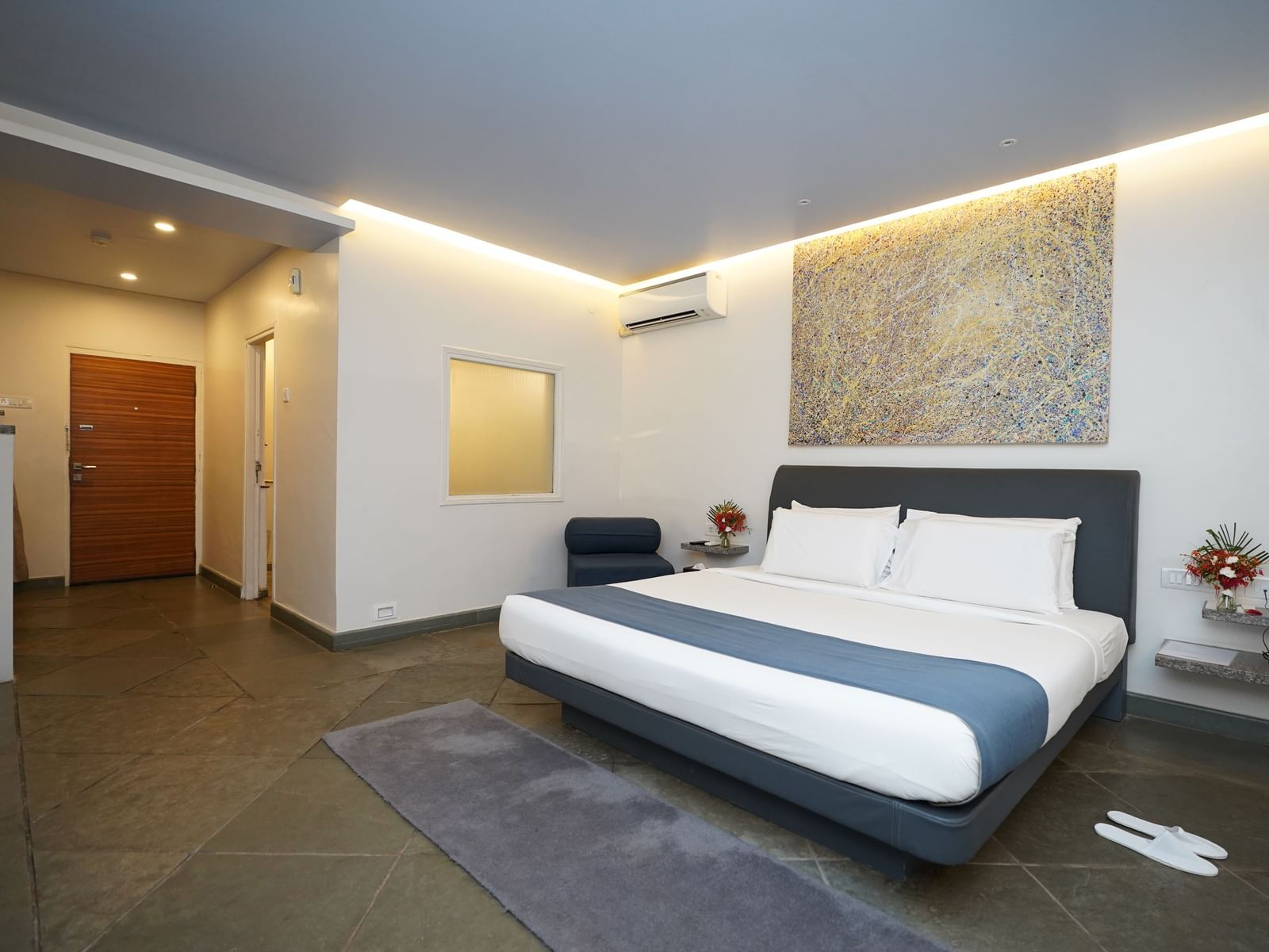 A deluxe bedroom with twin beds and other room amenities - Argo By Trance, Goa