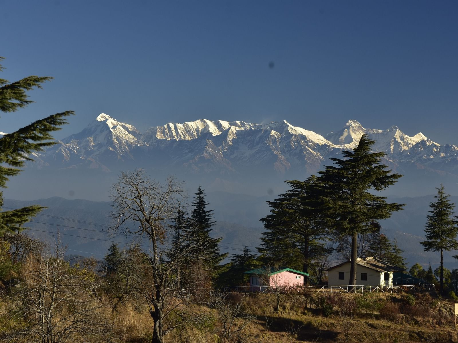 A distant view of snow-capped mountains - BluSalzz Escapade - Anant Rasa Resort