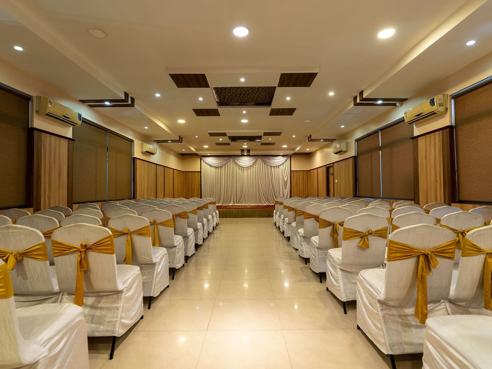 Seating arrangements inside a banquet hall - Hotel Pai Vista, KR Road