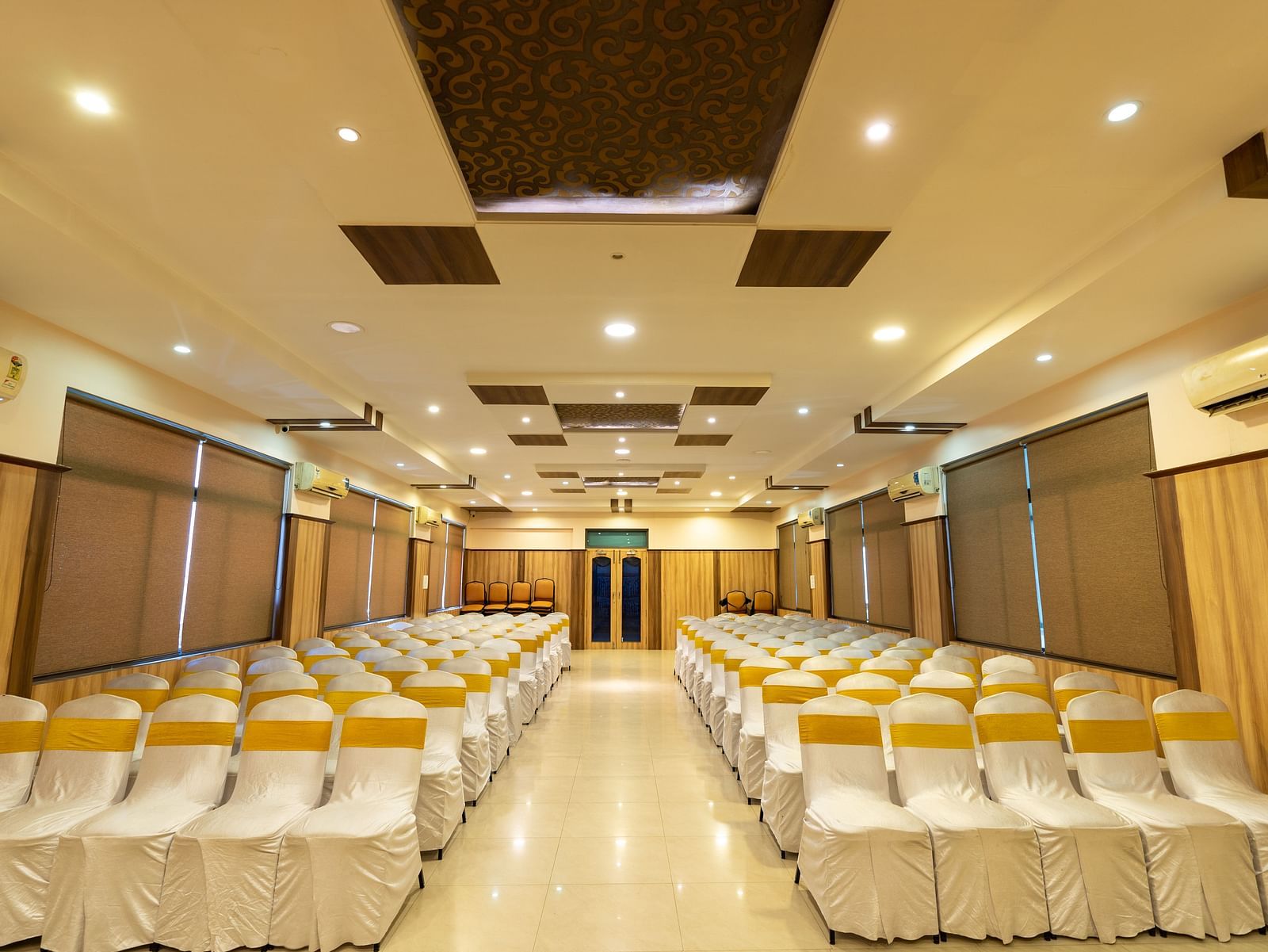 Seating arrangements inside a banquet hall - Hotel Pai Vista, KR Road