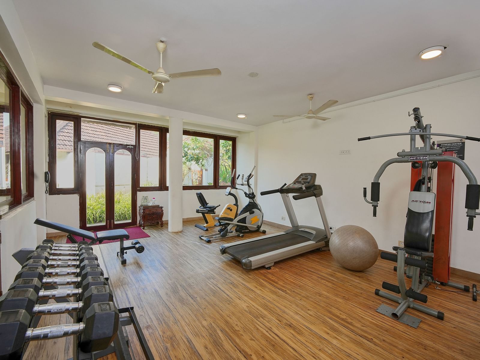Gym with dumbbells - Rhythm Kumarakom