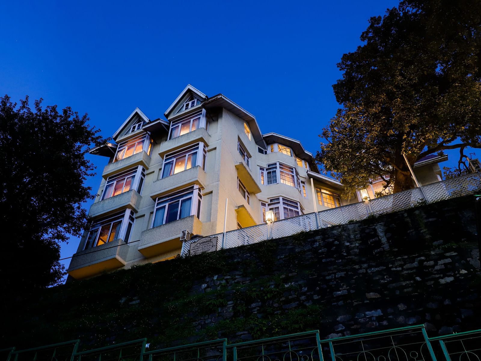 Nighttime exterior view of Summit Le Royale Hotel, Shimla