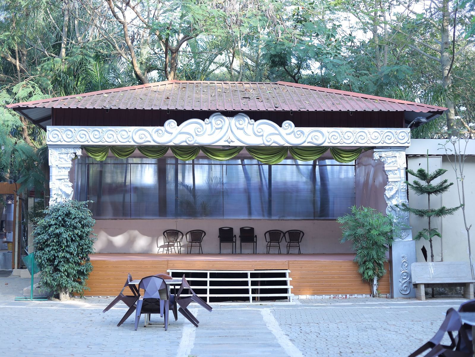 Entrance to an event hall at The Meenakshi Resort by Welcome Inn Hospitality, Bangalore.
