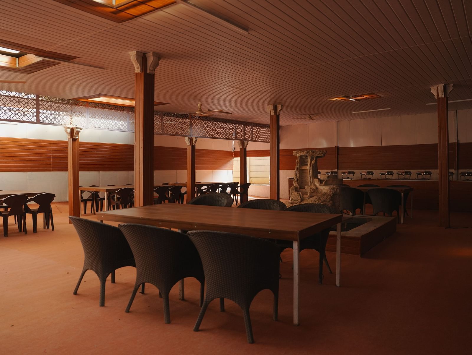A dining seating area at The Meenakshi Resort by Welcome Inn Hospitality, Bangalore.