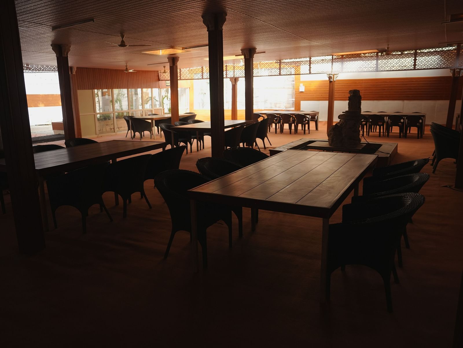 A dining seating area at The Meenakshi Resort by Welcome Inn Hospitality, Bangalore.