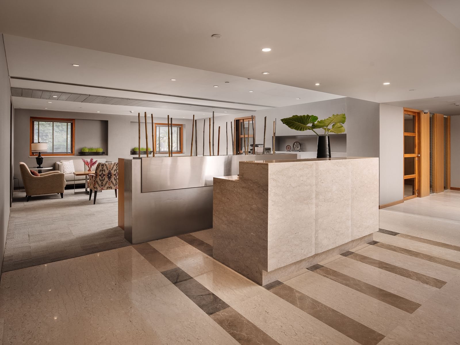 A stylish reception area with contemporary design, welcoming guests at The Raintree, St. Mary's Road.