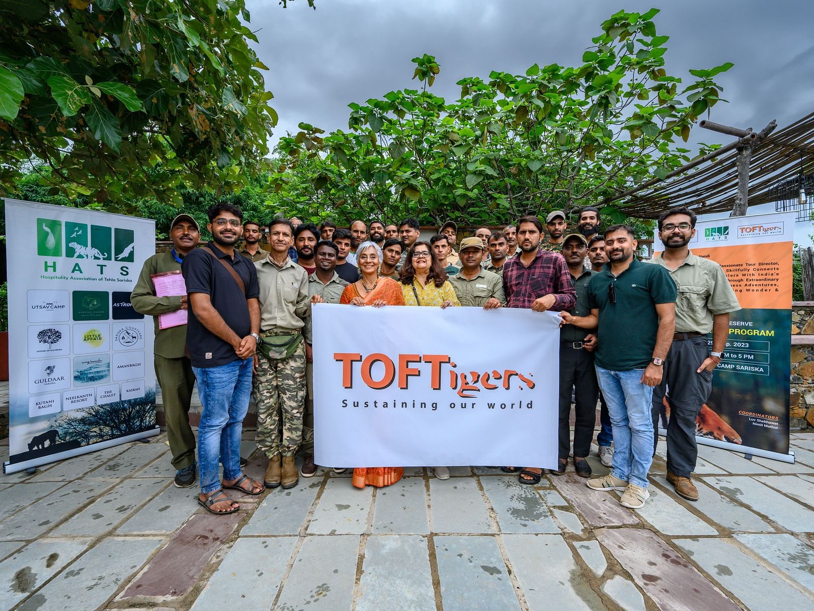 An image of a group of people with the TOFT award banner - Utsav Camp Sariska