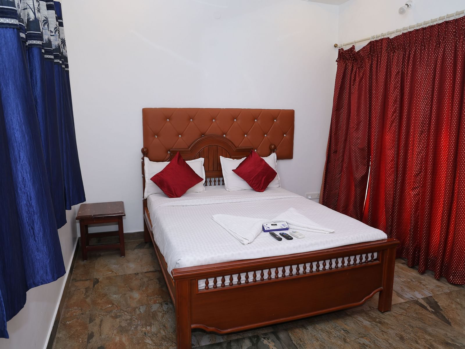 Image of a room with a bed a window on the side at Villa Serenity Le Sejour, Pondicherry.