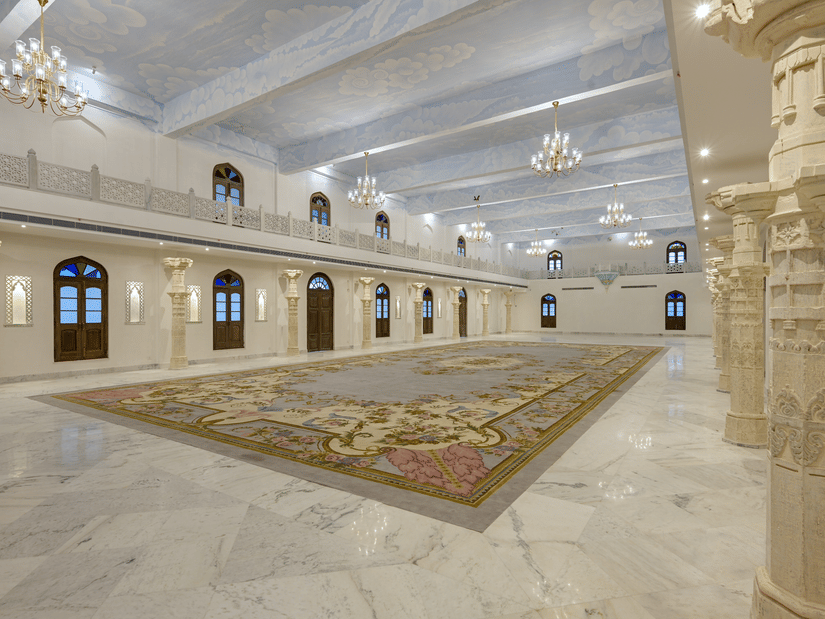 Fateh Vilas Udaipur - Surya Prakash hall with decor and chandeliers.