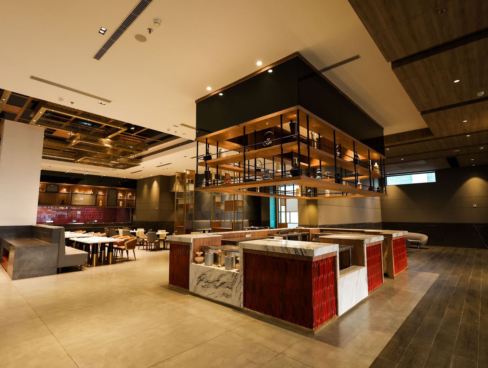 Buffet counter and open kitchen setup inside the restaurant at Ramada by Wyndham Sonipat Murthal