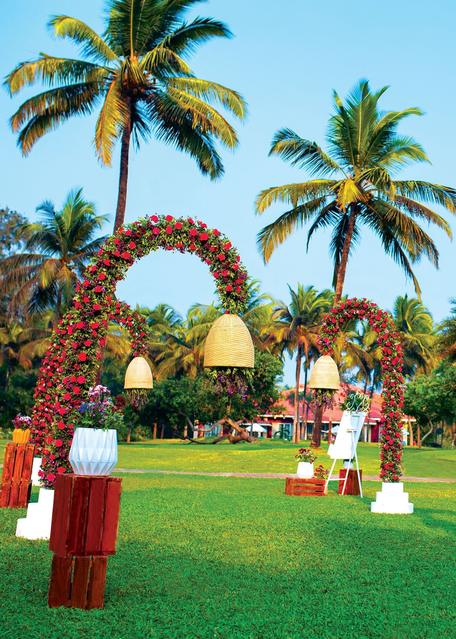 an overview of the lawn area with decorated lamp post - Caravela Beach Resort Goa