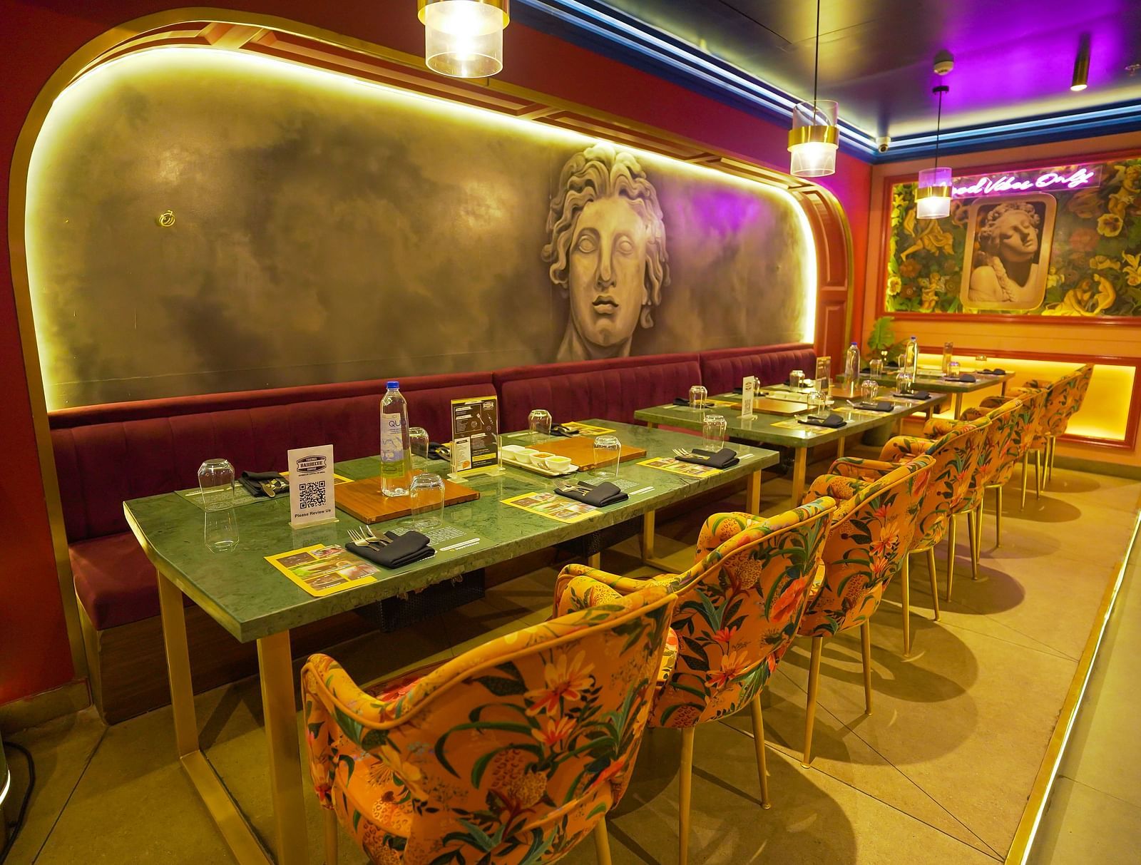 An image of a well lit restaurant featuring dining table and chair at Themis Barbecue House